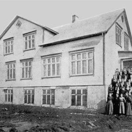 The original school building. Photographer unknown.