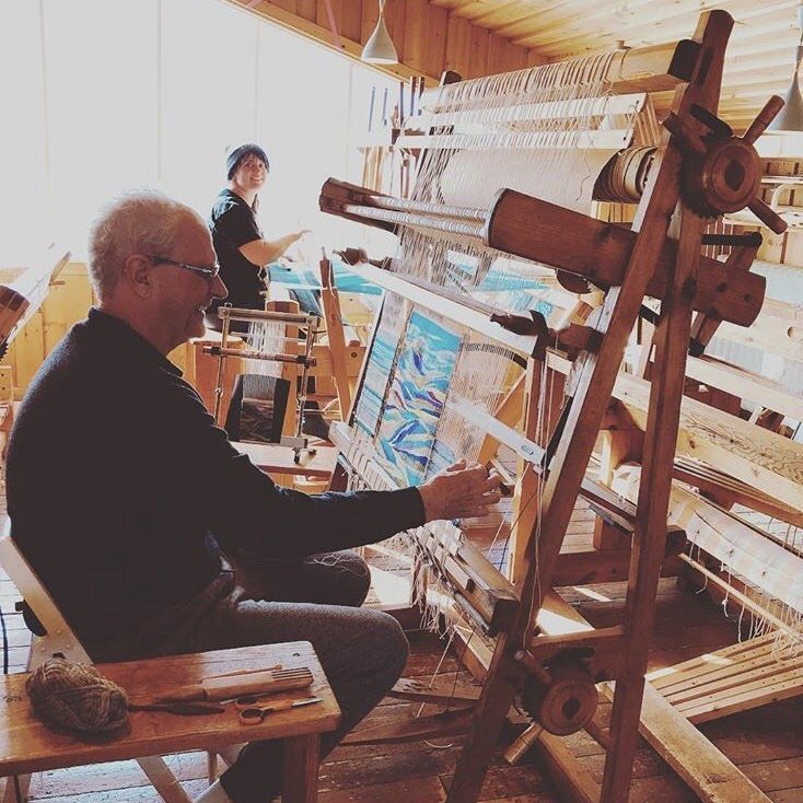 Blaine Davis working on the vertical tapestry loom in 2018. Picture: Textile Center.