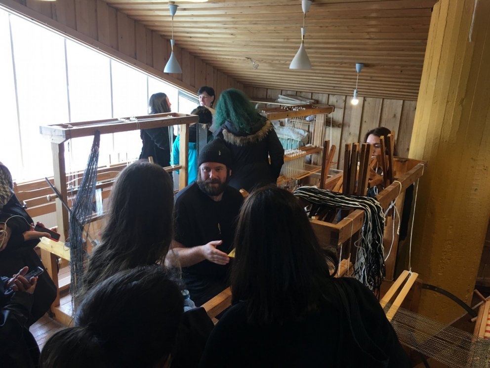 Artist in residence Morris Fox and Textile Bootcamp participants in the loom studio.